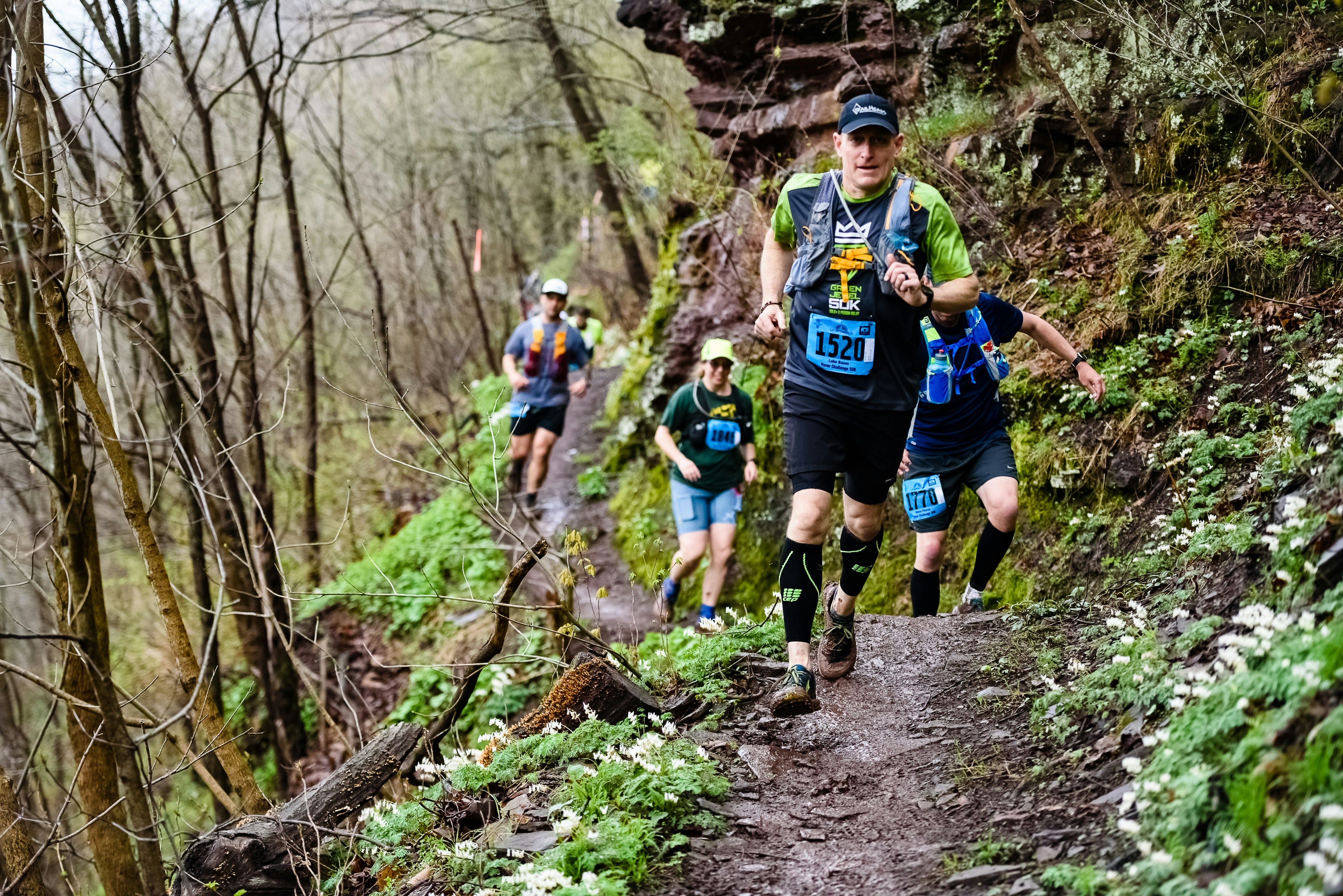Runners in a trail ultramarathon race